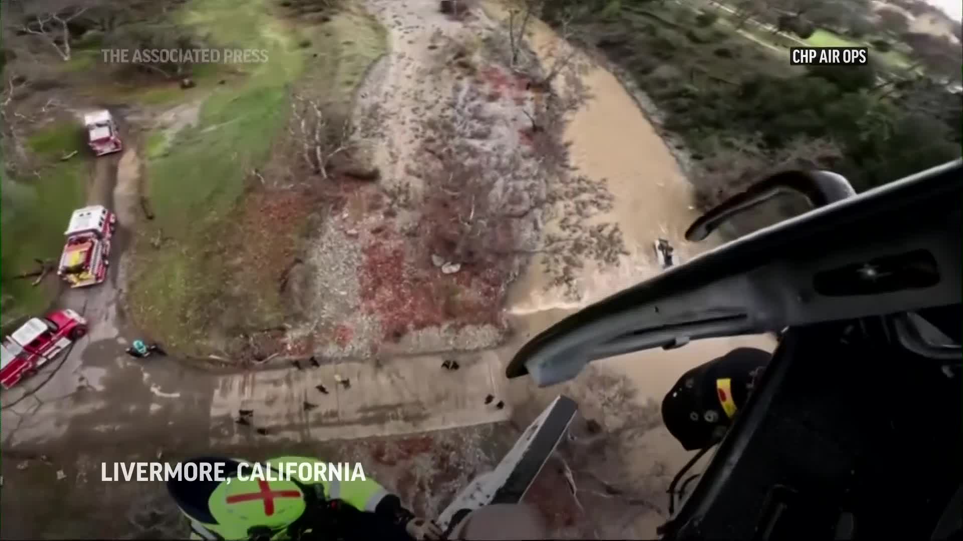 Woman survives nearly 15 hours on top of submerged car in California ...